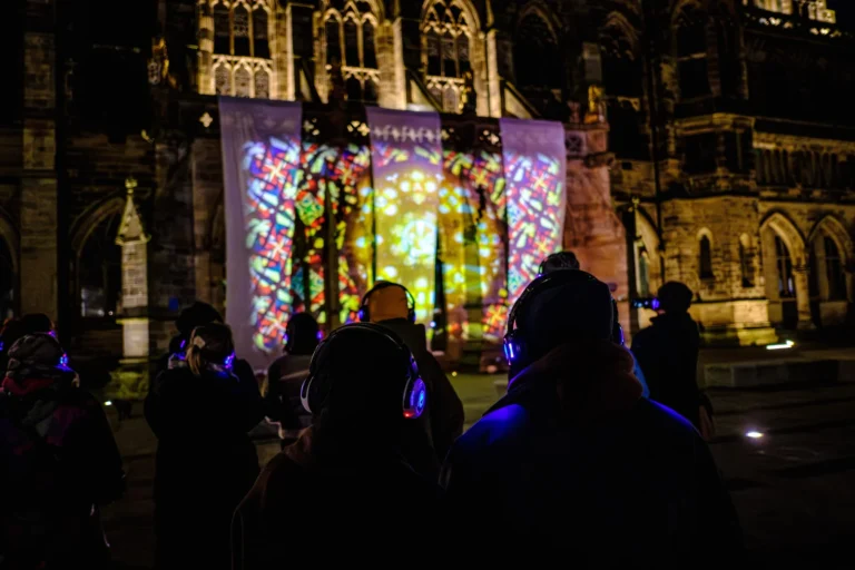 Projections lighting up Rochdale town hall during the Stories We Tell audio walk
